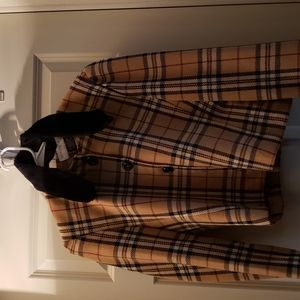 Petite Sophisticate Plaid Blouse. It's a symmetrical design.